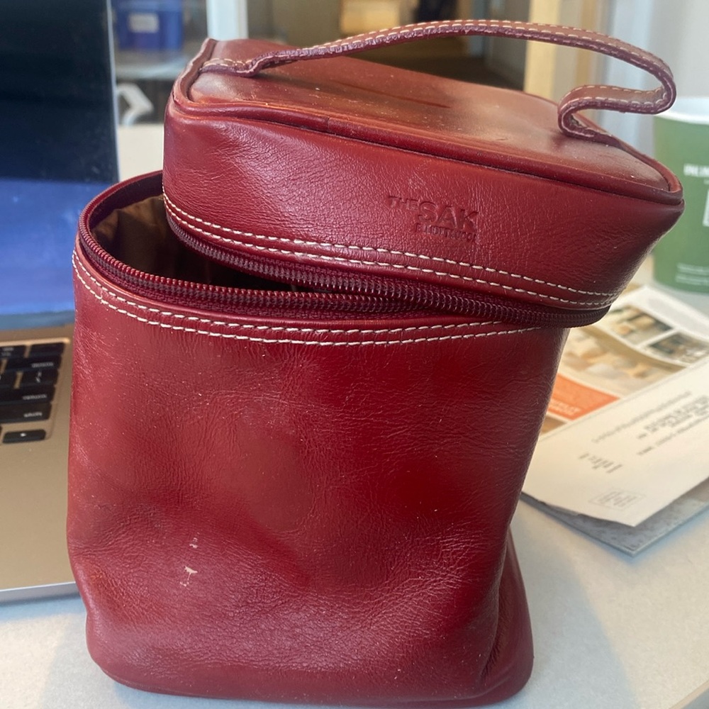 Beautiful red leather make up case with white stitching. Lesseck by Elliot Lucca